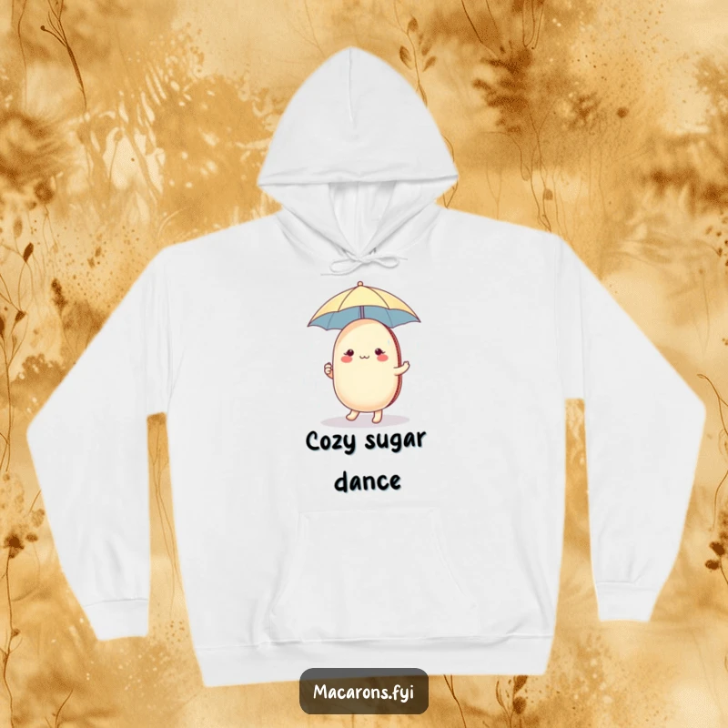 Soft hoodie featuring a funny macaron character holding a tiny umbrella, dancing in a delightful sugar shower.